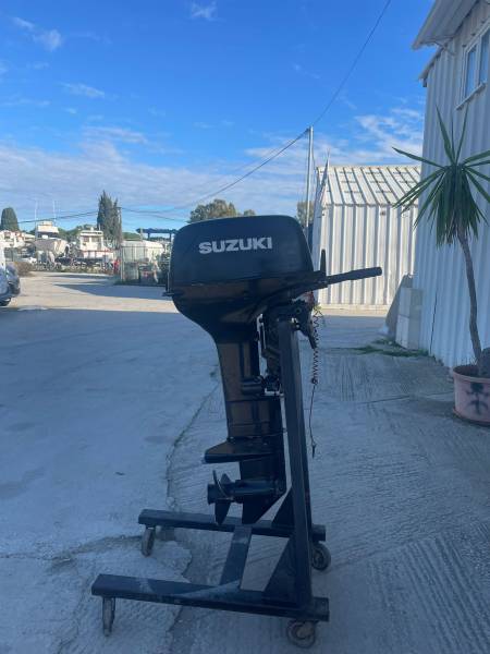Moteur 30cv suzuki 2 temps arbre long  barre franche